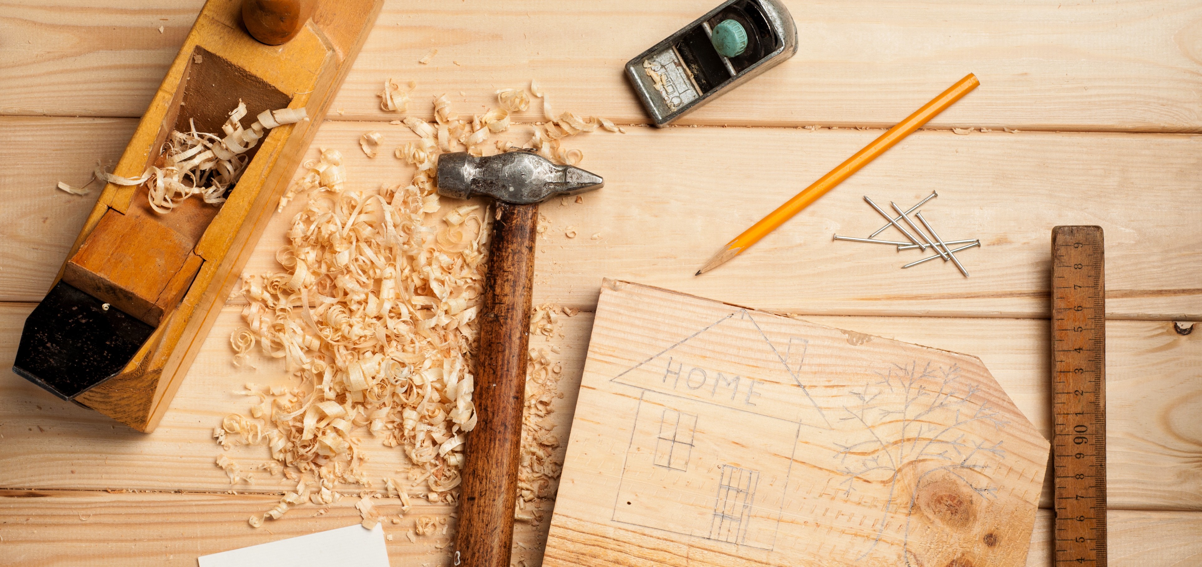 joinery tools on wood table background with business card